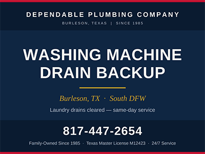 Laundry room standpipe drain behind a washing machine in a Burleson, TX home after a clog was cleared