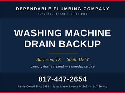 Laundry room standpipe drain behind a washing machine in a Burleson, TX home after a clog was cleared